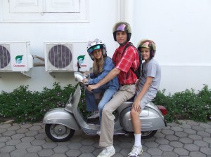 Anna, Dad, and Sam on the Vespa